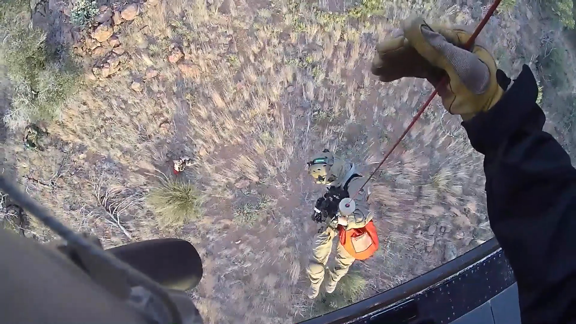 A migrant woman was rescued from mountains near Tucson, Arizona. She was dehydrated and unable to walk, border agents said.