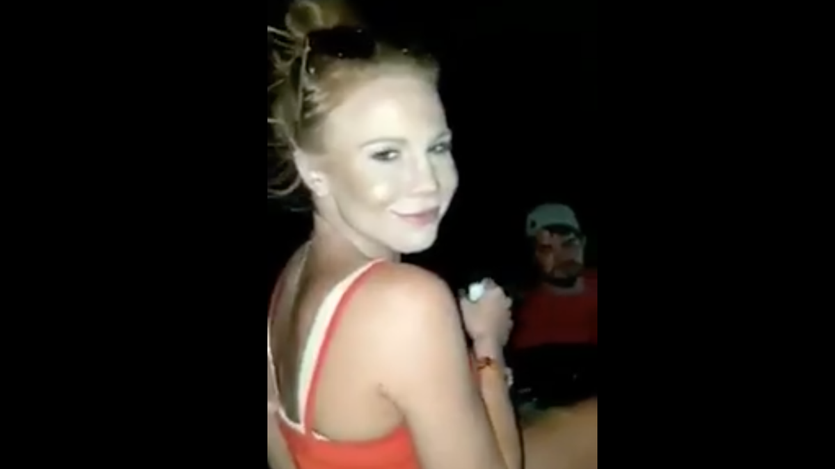 Tabbie Duncan, former waitress in Missouri, was fired from the Social Bar and Grill after a racist Snapchat video surfaced of her riding on a vehicle with men and going 'n-word hunting.' The Air Force is investigating if she is a new recruit.