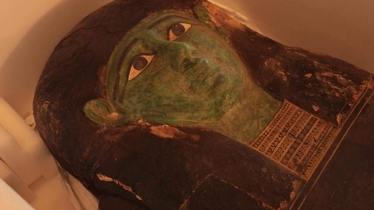 The “green coffin,” an ancient Egyptian sarcophagus which was looted by a global trafficking group, was returned to Egypt, officials said.