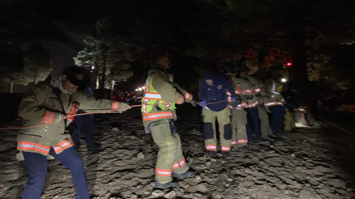 Firefighters helped pull a woman to safety after she was found on a steep slope in Nevada.