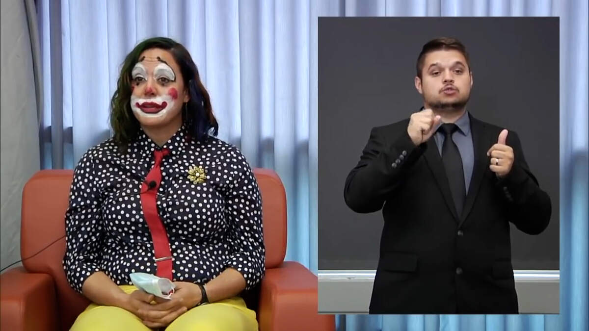 Claire Poche of the Oregon Health Authority was dressed as a clown while providing an update on confirmed cases of and deaths from COVID-19.