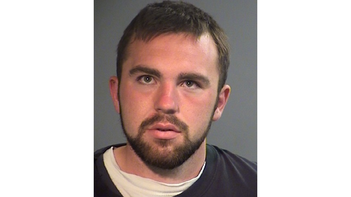 Oregon police arrested Anthony Clark, accused of being high on LSD and stealing a car before driving through fences, over spike strips and down the wrong way of roads throughout a 40-mile cop chase in Grants Pass. Police say he thought he was playing 'Grand Theft Auto.'