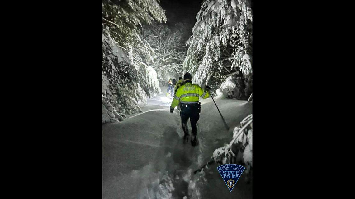 Two hikers became stranded in a Massachusetts forest overnight, officials said.