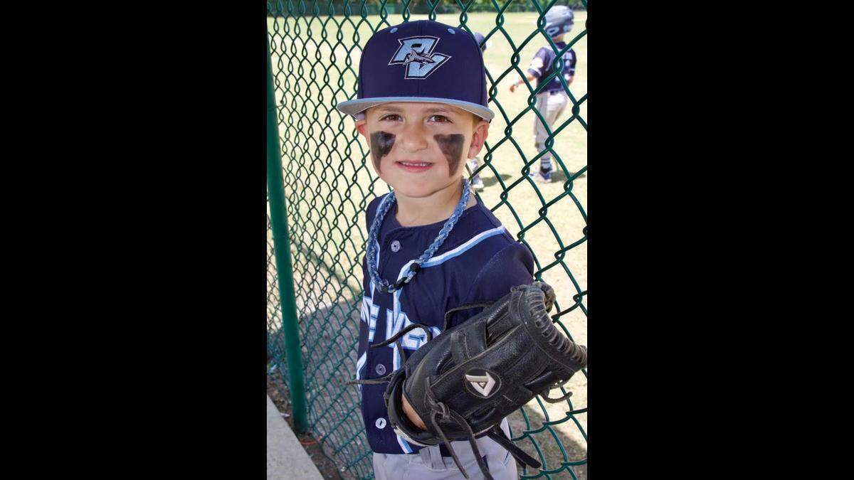 Bauer Zoya, 7, said he was a little scared at first when the dust devil swirled up around him on the field.