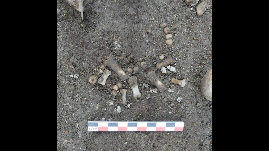 Rosary beads found among the burials.
