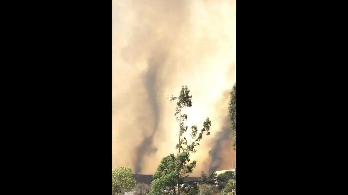 Fire whirls or tornadoes appeared as crews battled the Tenaja Fire in Murrieta, California, video shows.