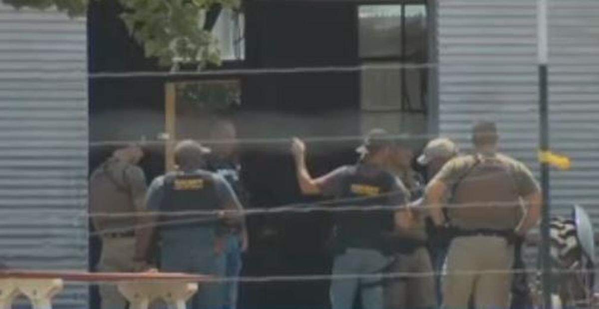 Lubbock police investigate a shooting between neighbors Monday.