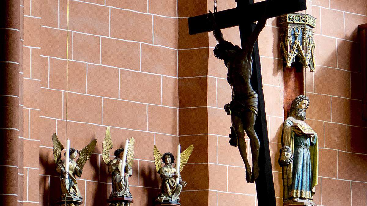A crucifix is fixed at the ceiling of the Cathedral in Frankfurt, Germany.