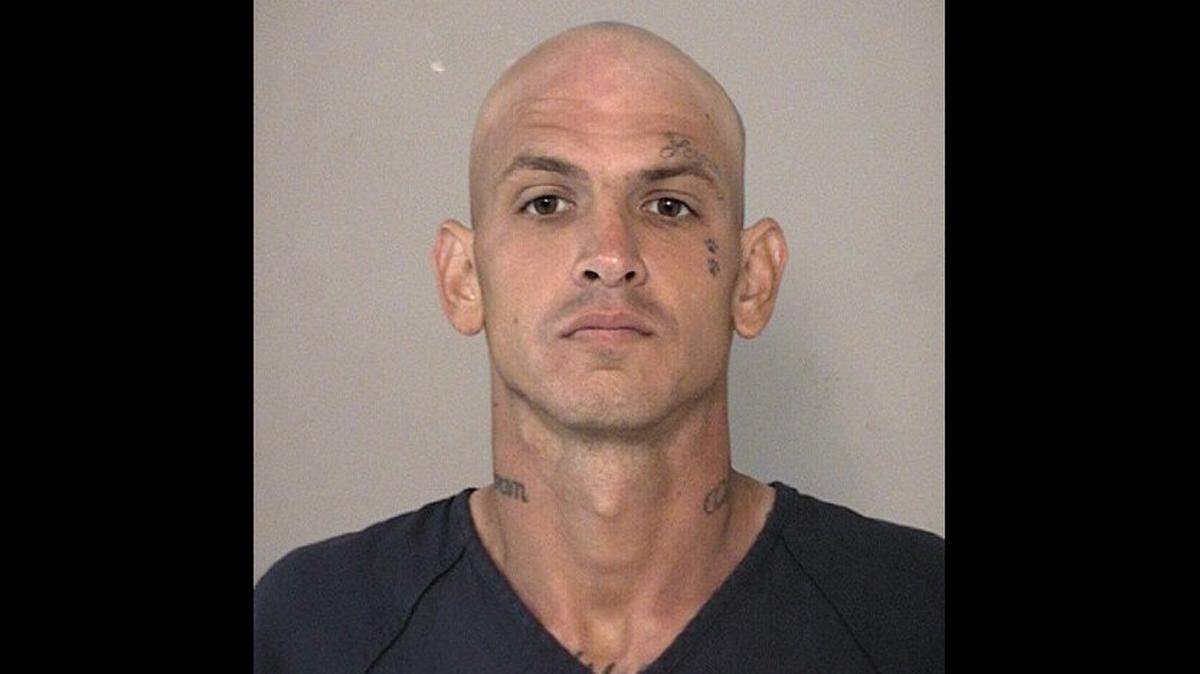 Robert Allen Satterfield, 36, is charged with three counts of murder after police say he led them to the charred skeletal remains of the family of three whose car he was driving when he was pulled over Thrursday.