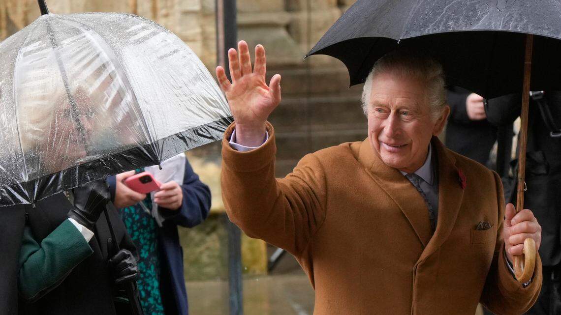 Britain’s King Charles III waves to the crowd outside York Minster after the king unveiled a statue of the late Queen Elizabeth II in York, England, Wednesday, Nov. 9, 2022. (AP Photo/Alastair Grant)