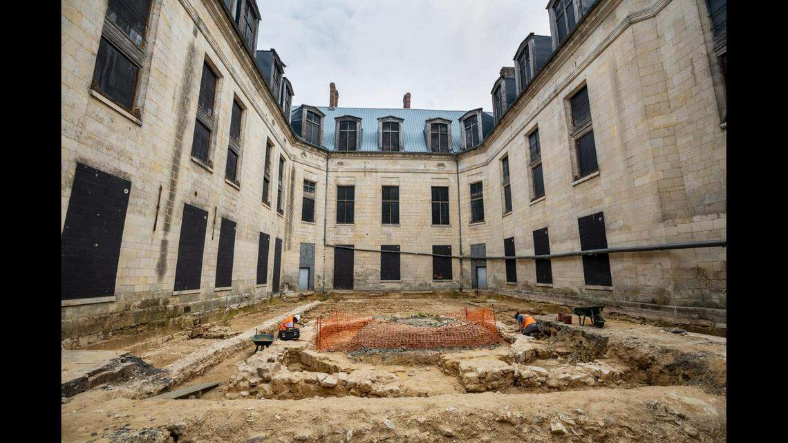 Experts worked to excavate the remains of the tennis court’s tile.