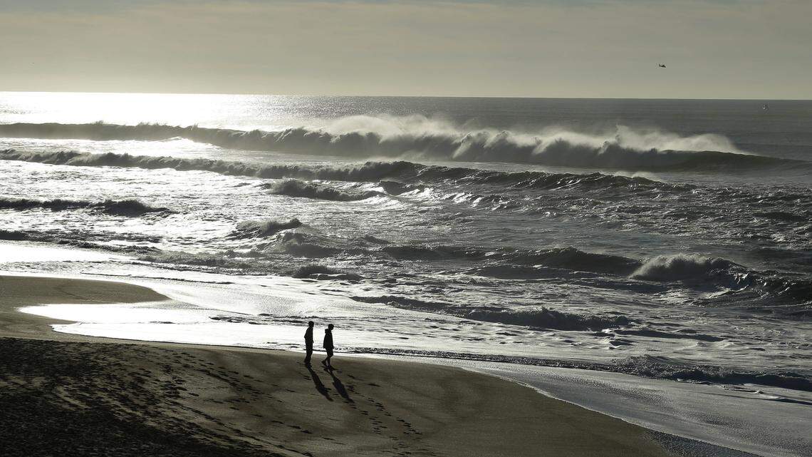 A couple walks along the North Beach in 2013 at the Point Reyes National Seashore in California.
