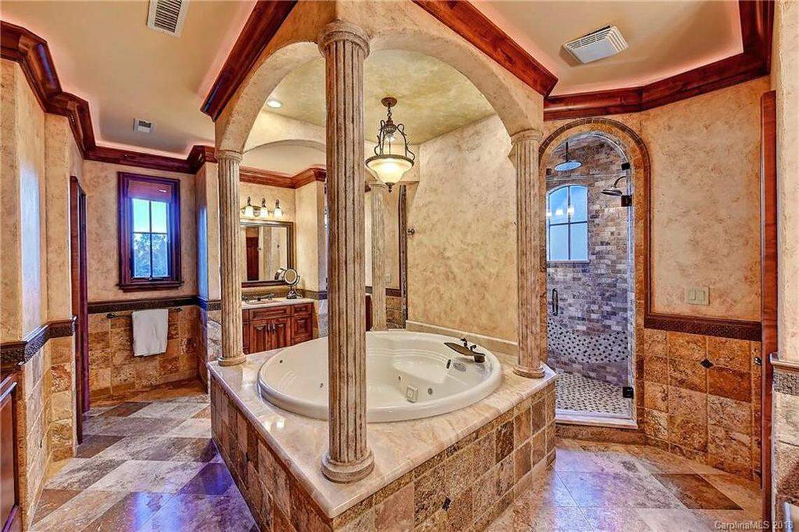One of the home’s notable features is its four-columned bathtub.
