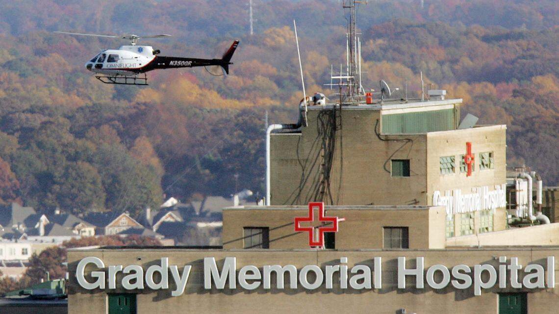 An air ambulance makes its approach to the pad at Grady Memorial Hospital in Atlanta, Friday, Nov. 16, 2007. Grady Memorial Hospital Corporation, a public hospital in Atlanta, is being sued after it refused to process the medical leave of an employee with a disability as an accommodation under the Americans with Disabilities Act, according to the U.S. Equal Employment Opportunity Commission.