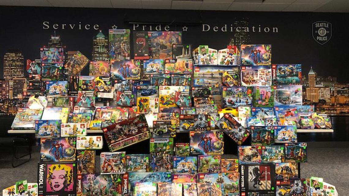 A Washington store owner was arrested and charged with trafficking in stolen Lego sets, police said.