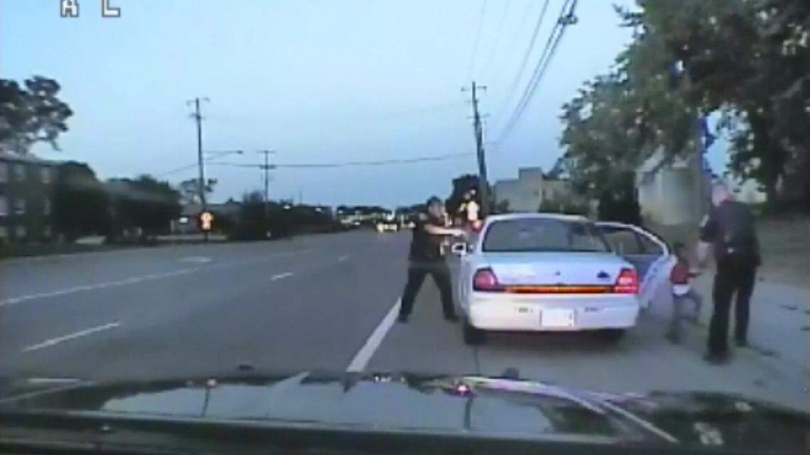 In this image made from July 6, 2016, video captured by a camera in the squad car of St. Anthony Police officer Jeronimo Yanez, the Minnesota police officer is shown after shooting into the vehicle at Philando Castile during a traffic stop in Falcon Heights, Minn., as the 4-year-old daughter of Castile’s girlfriend, Diamond Reynolds, starts to get out of the car and is grabbed by an officer. The video was made public by the Minnesota Bureau of Criminal Apprehension and the Ramsey County Attorney’s Office, Tuesday, June 20, 2017, just days after the officer was acquitted on all counts in the case.