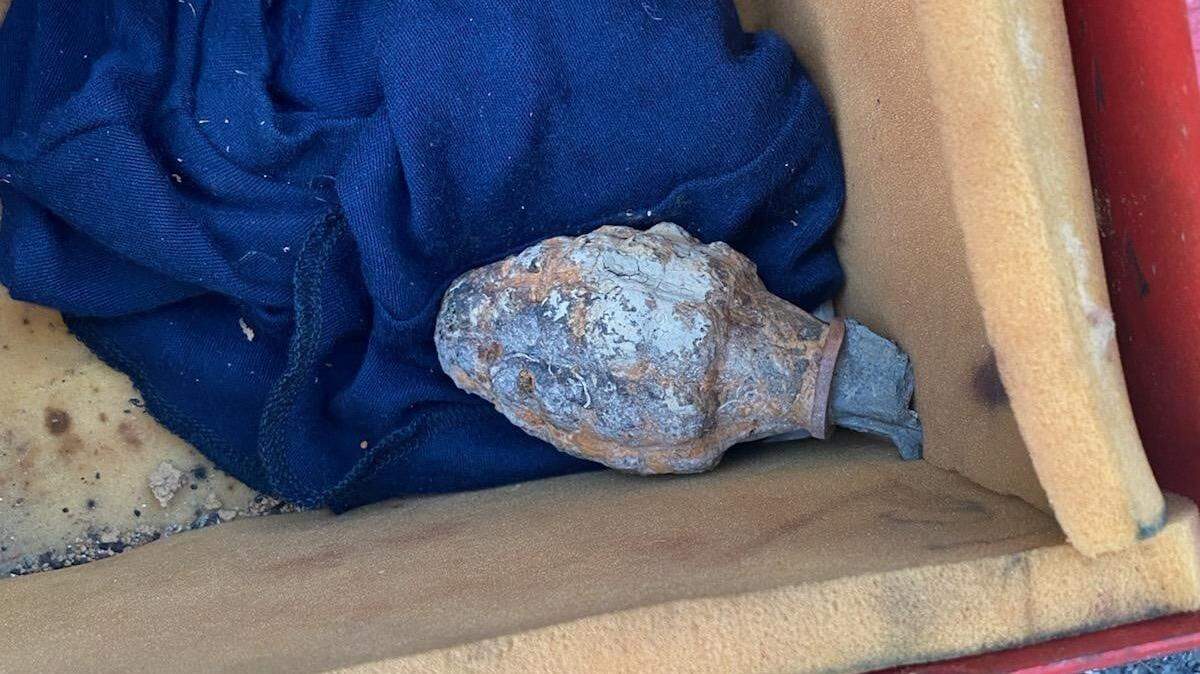 A magnet fisherman reeled in a grenade off a bridge over Clarks River near Paducah, Kentucky, and the bomb squad responded, the McCracken County sheriff says. Photo from Paducah Police Department on Facebook.
