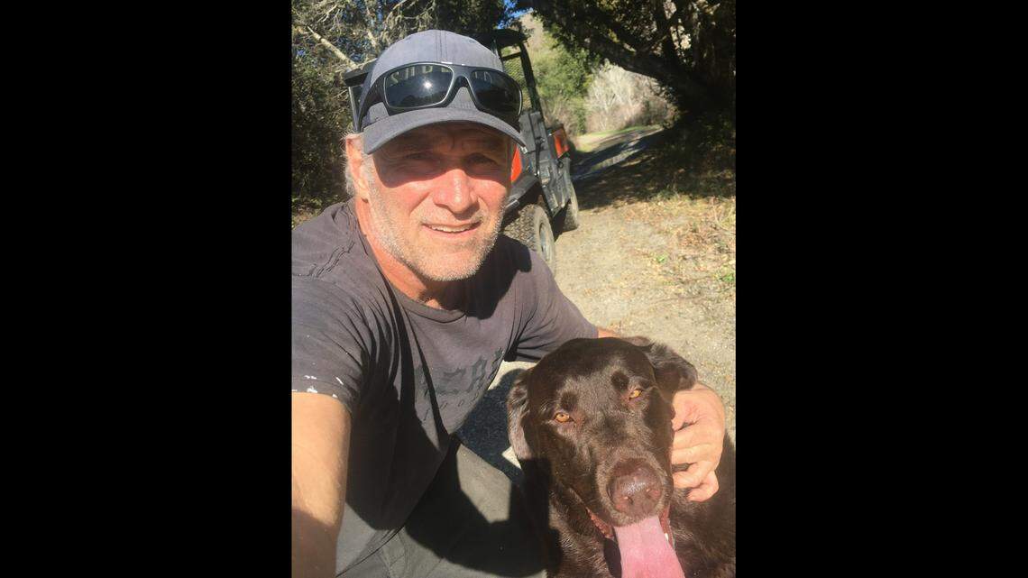 Shawn Rhodes was walking with his dog, Yoda, on a California beach when two park rangers tackled him after asking him to put his dog on a leash, he said. He is suing the parks department.
