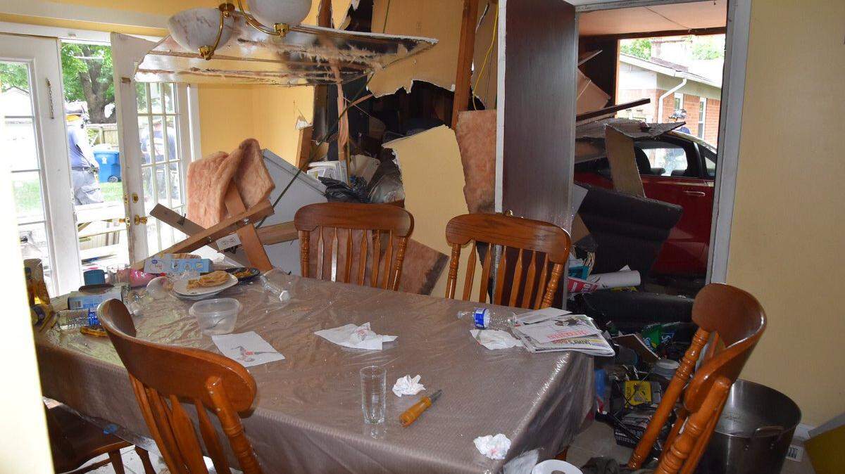 A woman driving in Indianapolis missed a turn, left the roadway and plowed into a family’s home, pinning a teen girl between a kitchen table and a wall, firefighters say. The girl had to be saved by firefighters and the home was left with $50,000 in damage.