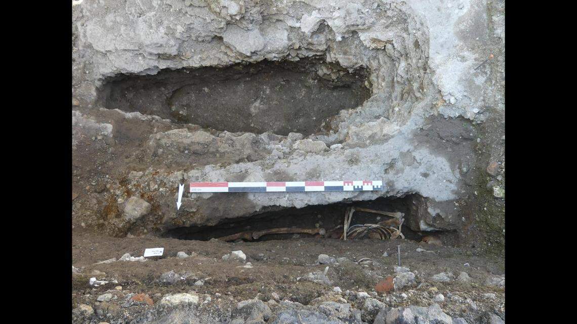 A rock grave that was built into the ground.