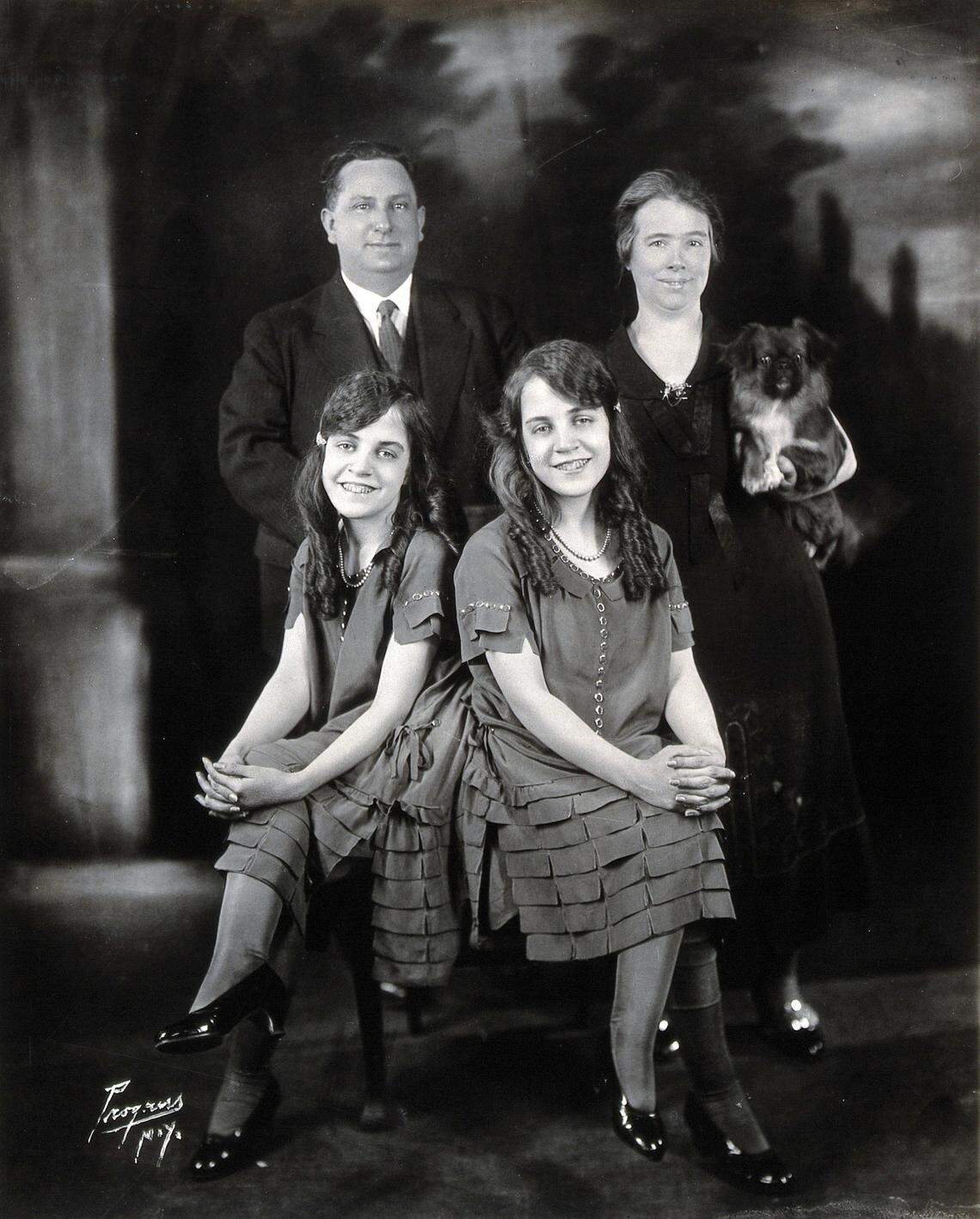 Edith Hilton and her partner Myer Myers took control of the Hilton sisters’ career when their guardian Mary Hilton died, according to historical record. The conjoined twins, pictured here around 1927 with Edith Hilton and Myer Myers, sued for their independence in the 1930s.