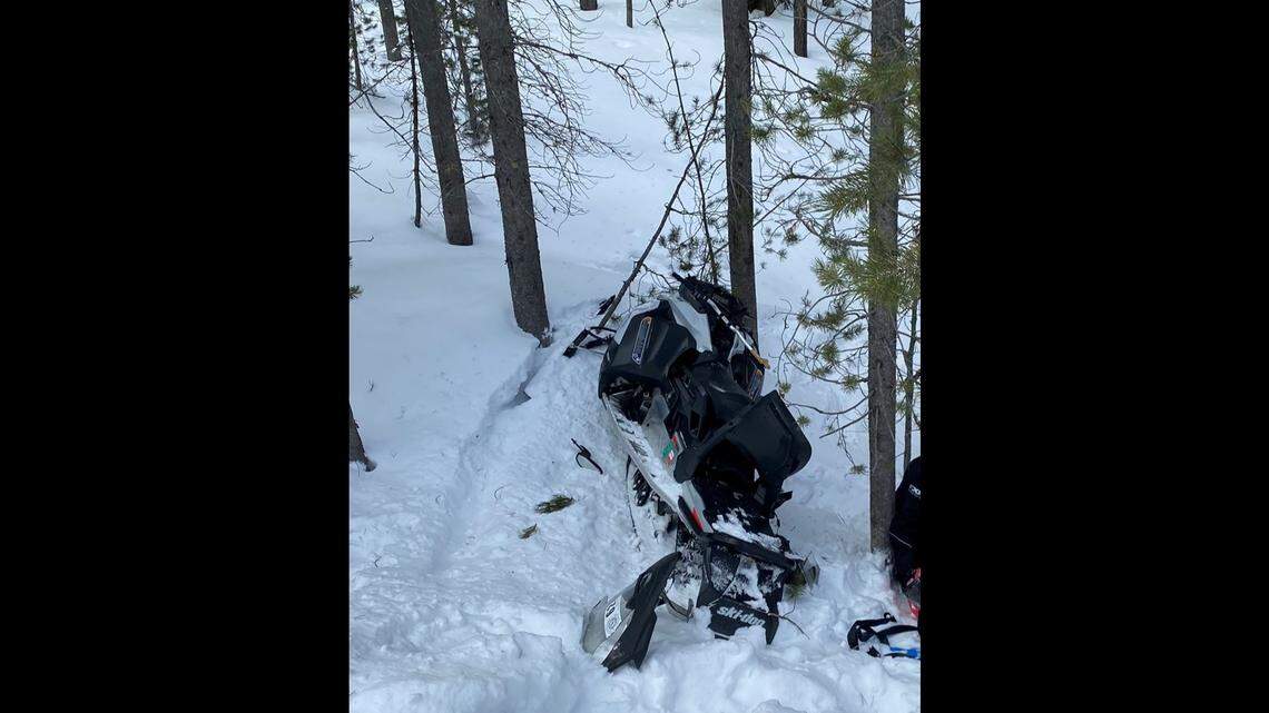A snowmobiler and their passenger were injured after crashing into a tree near Yellowstone.