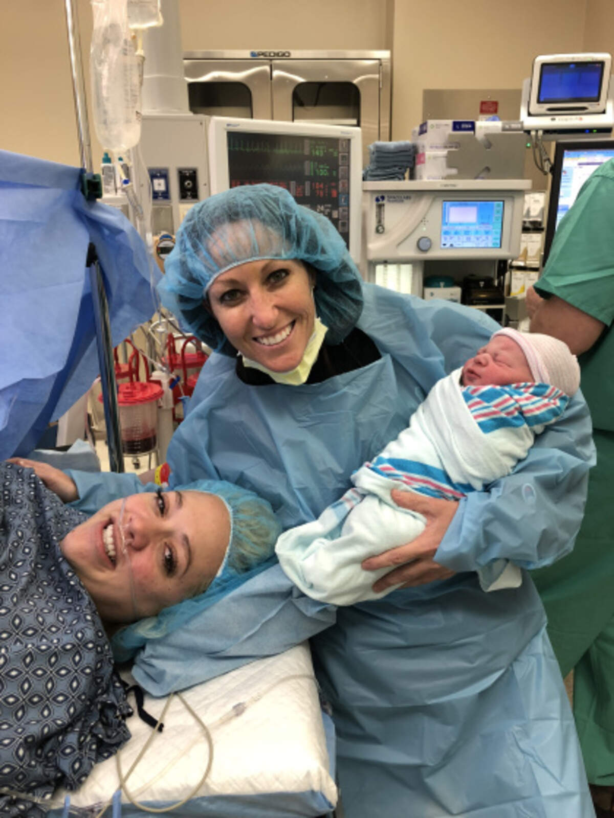 Ashleigh Coulter delivered baby Stetson in June. Stetson came from DNA from Ashleigh’s wife Bliss, right, and a sperm donor.