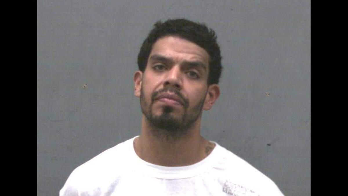 Isaias Garcia, 30, is charged with first-degree kidnapping after police say he sent a victim's aunt a ransom photo of her nephew hogtied in a bathtub with an alligator.