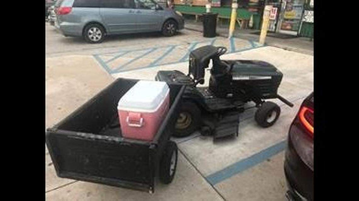 Police shared a photo of the lawnmower involved in the incident, which was hauling a trailer with a cooler inside.