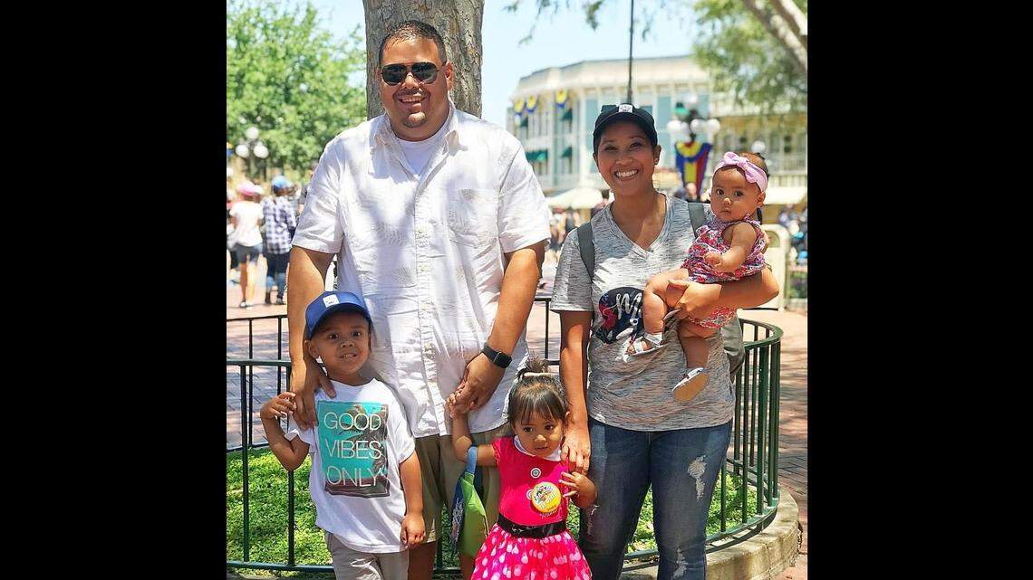 Davy and Daniel Macias with their children