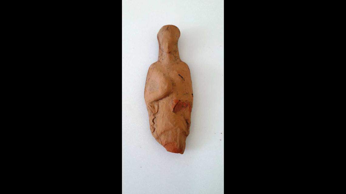 A clay figurine of a woman that was unearthed at the site.