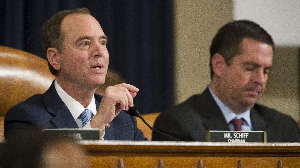 House Intelligence Committee Chairmen Rep. Adam Schiff, D-Calif., left, speaks as ranking member Rep. Devin Nunes, R-Calif., right, looks on, as former U.S. Ambassador to Ukraine Marie Yovanovitch testifies before the House Intelligence Committee on Capitol Hill in Washington, Friday, Nov. 15, 2019, during the second public impeachment hearing of President Donald Trump’s efforts to tie U.S. aid for Ukraine to investigations of his political opponents. (AP Photo/Alex Brandon)