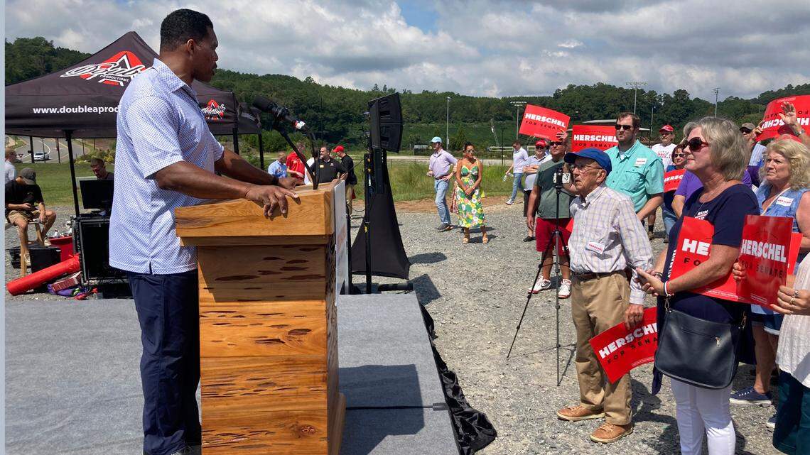 Republican Senate nominee Herschel Walker campaigns Wednesday, Sept. 7, 2021, in Emerson, Georgia, north of Atlanta. At a Sept. 16 press conference, Walker told reporters he is “not that smart.”