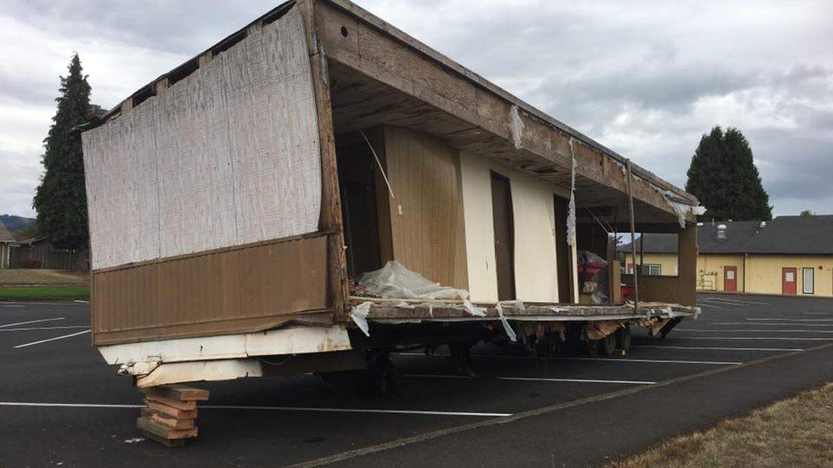 The half trailer was discovered at the elementary school near Portland on Saturday, authorities said.