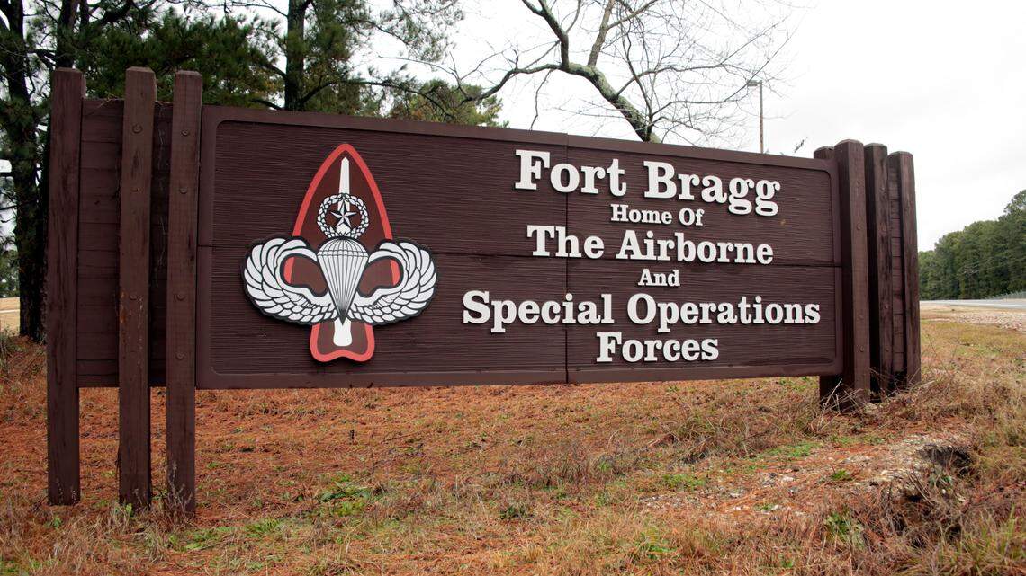 This Jan. 4, 2020 file photo shows a sign for at Fort Bragg, N.C. A Fort Bragg employee received hundreds of thousands of dollars in bribes in exchange for pushing maintenance contracts with the government, prosecutors said. Now, the man is sentenced to 42 months in prison.