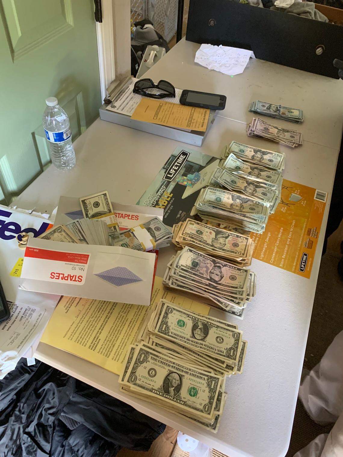 Authorities said they discovered more than $150,000 in cash at the home in rural Scotts Valley, California.