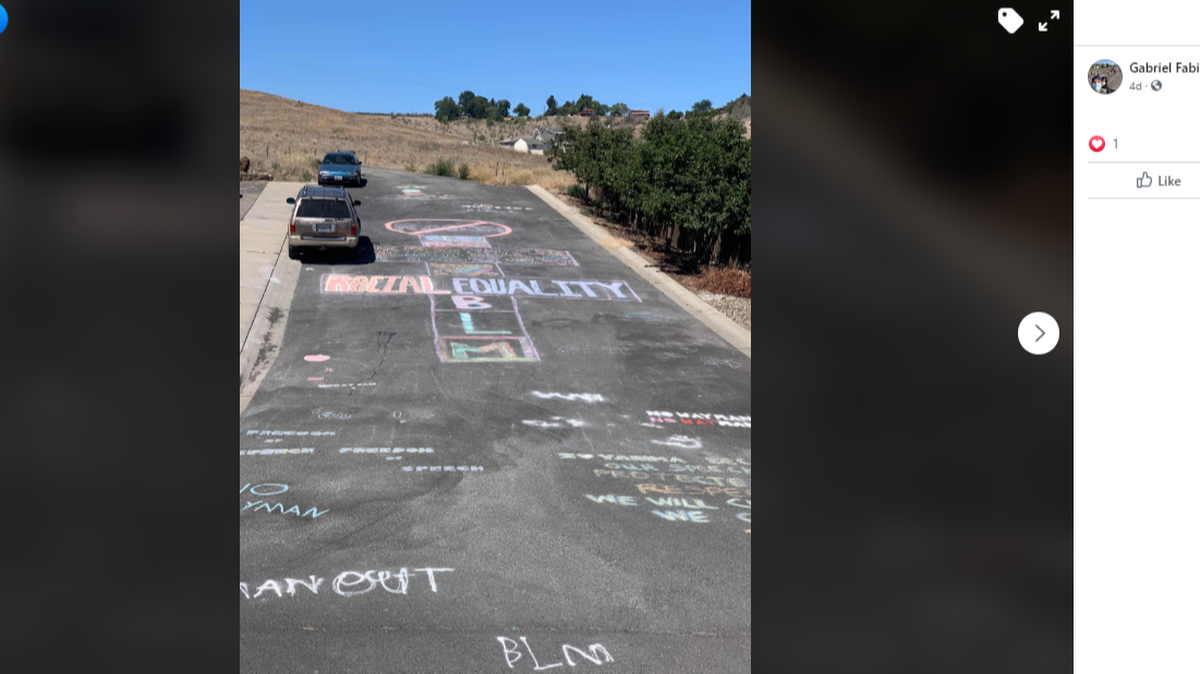 A Washington police department put an officer on leave after he confronted a family for their chalk display supporting Black Lives Matter. A video showed the off-duty officer carrying a gun during the confrontation.