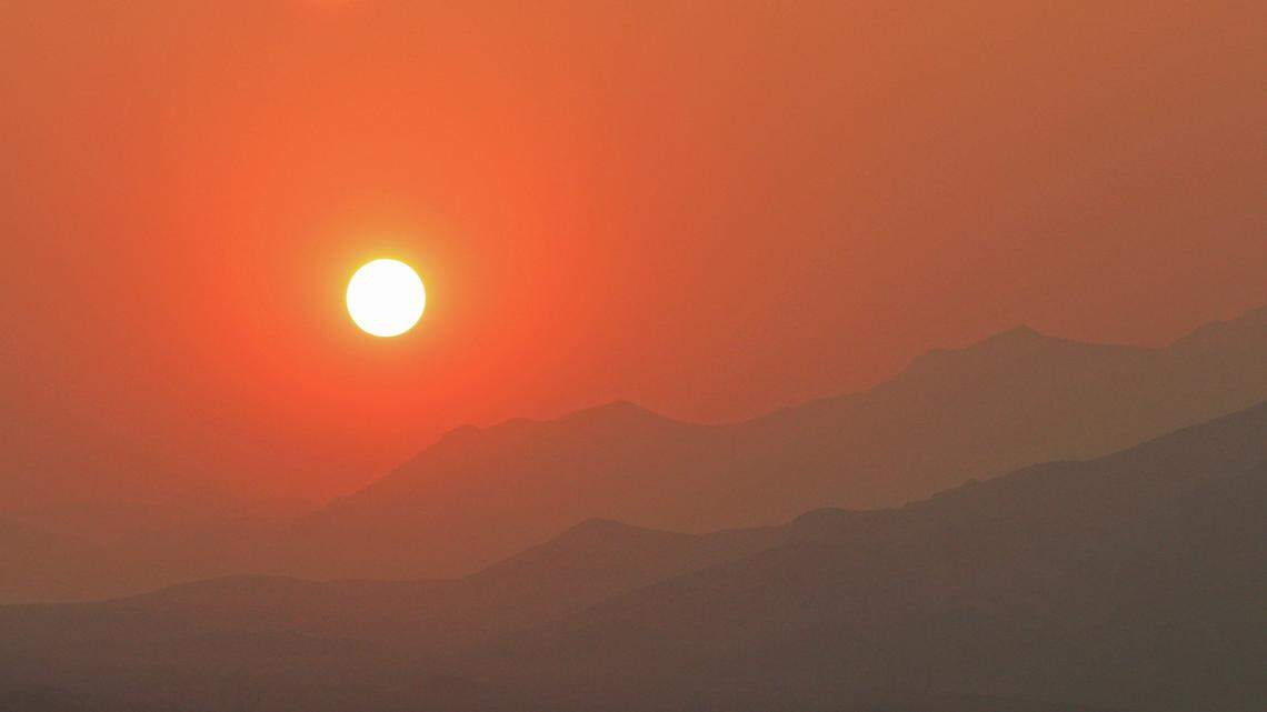 Sunrise over Funeral Mountains in Death Valley National Park.