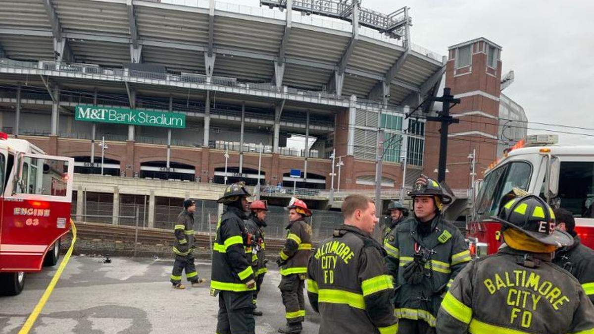 Baltimore firefighters put out a port-a-potty blaze outside M&T Bank Stadium that killed one man, who was seen on fire running from one of the potty units Sunday afternoon.