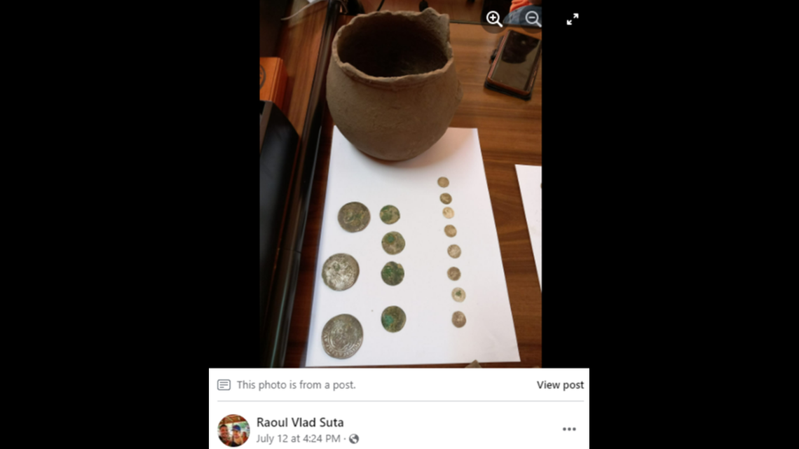 The coins were found in a ceramic vessel, Facebook photos show.