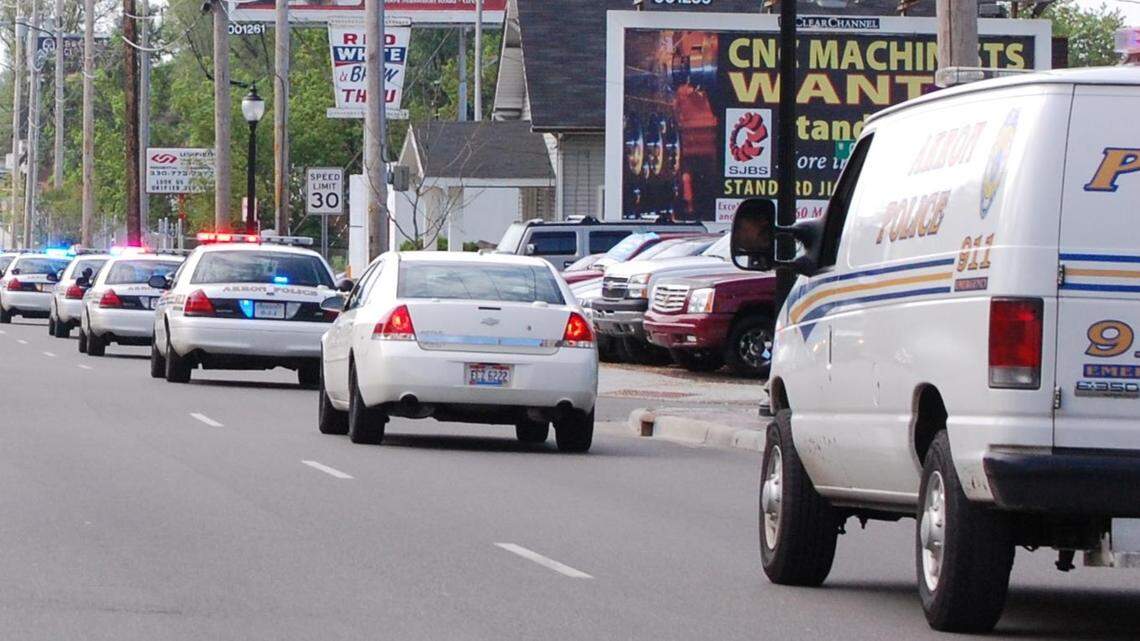 A 29-year-old woman has a broken jaw after police say her boyfriend honked at a motorcyclist stopped at a green light in Akron, Ohio, and the biker got off his motorcycle to throw a piece of concrete into their car. Police are looking for the suspect.