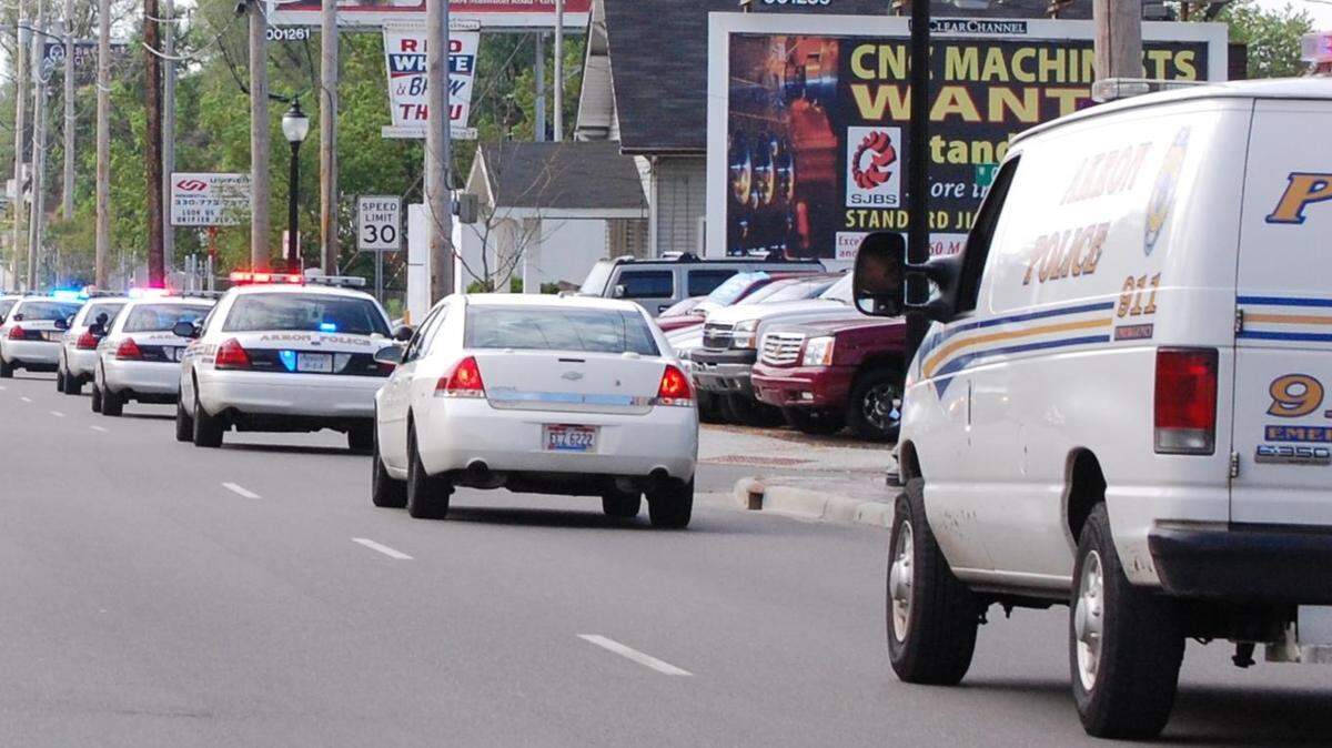 A 29-year-old woman has a broken jaw after police say her boyfriend honked at a motorcyclist stopped at a green light in Akron, Ohio, and the biker got off his motorcycle to throw a piece of concrete into their car. Police are looking for the suspect.