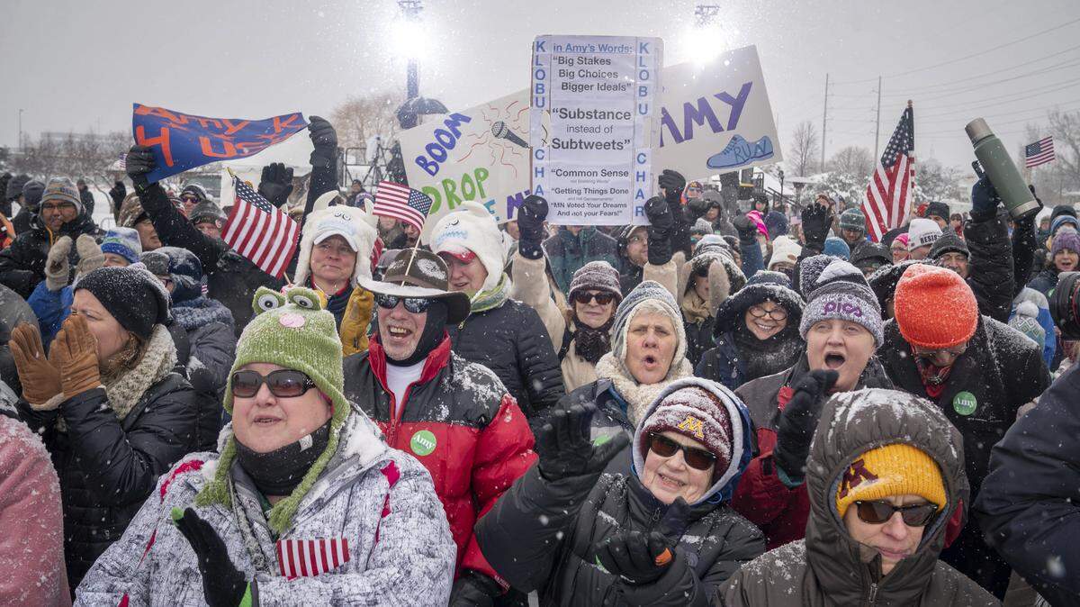 Amy Klobuchar supporters cheer as a DJ takes the stage before Sen. Amy Klobuchar’s announcement announcement to run for president Sunday, Feb. 10, 2019, from a snowy Boom Park, in Minneapolis. (Glen Stubbe/Star Tribune via AP)