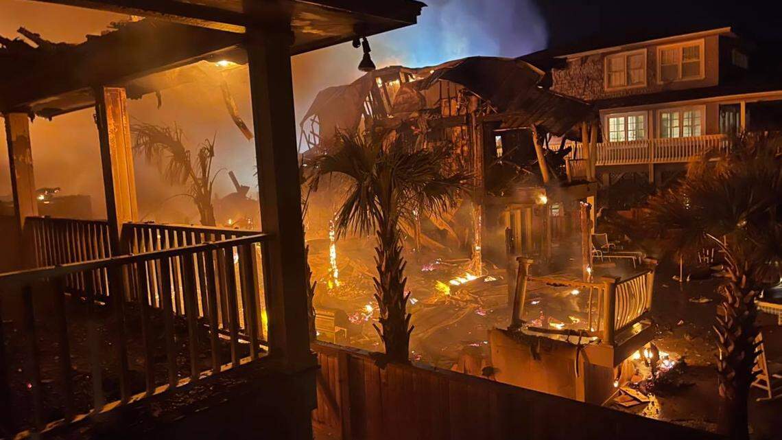 A vacation house was destroyed and a neighboring home badly damaged in an overnight fire Wednesday in Ocean Isle Beach, North Carolina.