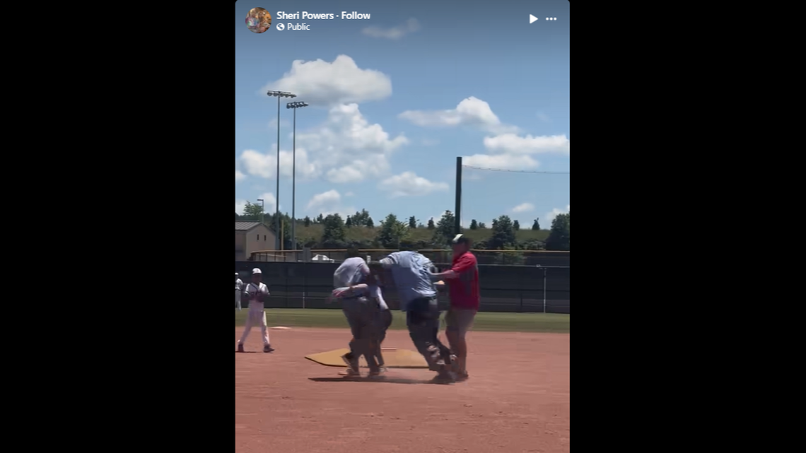 An umpire at a youth baseball game in Alabama was tackled after a coach thought he made a bad call, a video shows.