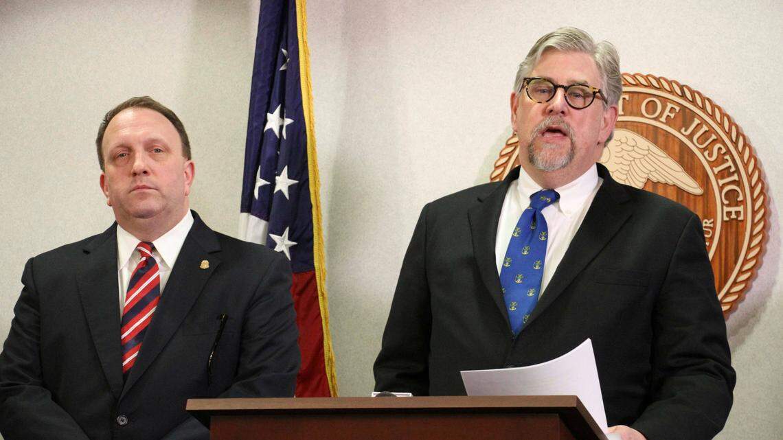 Jeffery Peterson, special agent in charge of the Anchorage FBI office, left, and Bryan Schroder, Alaska’s U.S. attorney announce that several members of a white supremacist gang in Alaska prisons or shipped to facilities in Colorado and Arizona have been charged in a racketing enterprise in Anchorage.