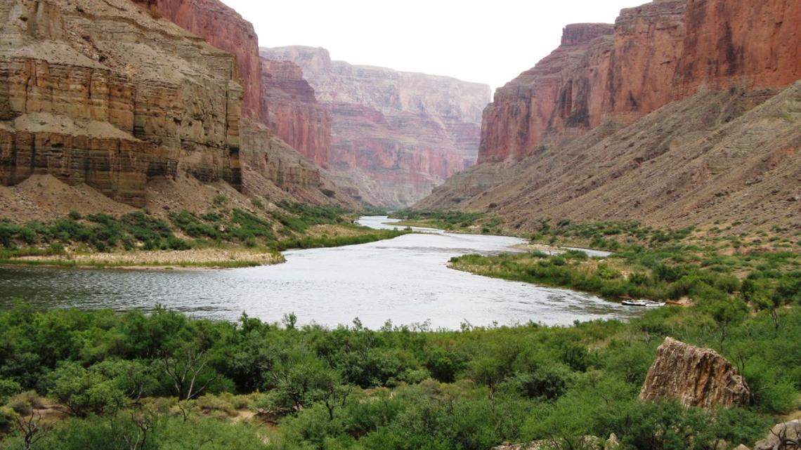 A woman died and two other people were injured after a boating accident on the Colorado River in the Grand Canyon, officials said.