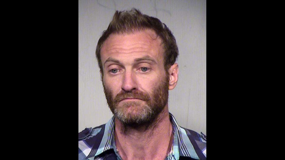 An Arizona man faces charges after police say he stole an ambulance from a Mesa hospital he was released from because it was “too hot to walk home.”