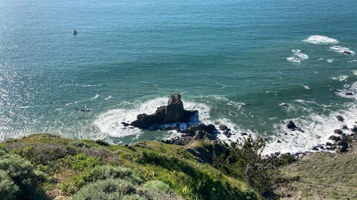 A fisherman was swept away by the waves at Muir Beach, officials said.