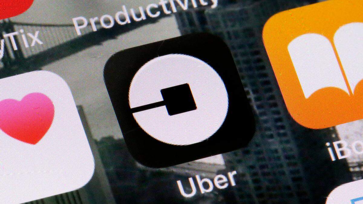 A 2018 file photo shows the Uber app on a phone in New York.